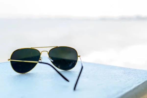 sunglasses on the beach in the mountains