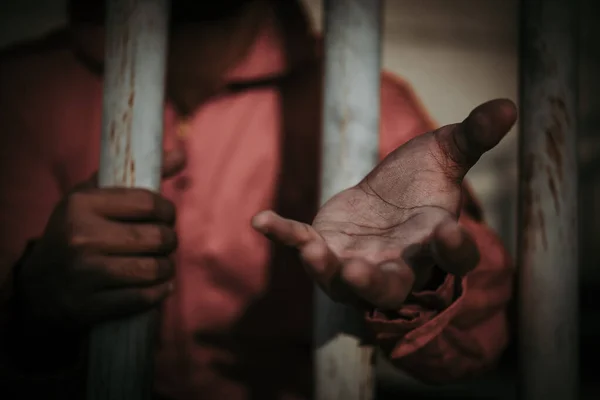 stock image Hands of men desperate to catch the iron prison,prisoner concept,thailand people,Hope to be free,A person guilty are punished.