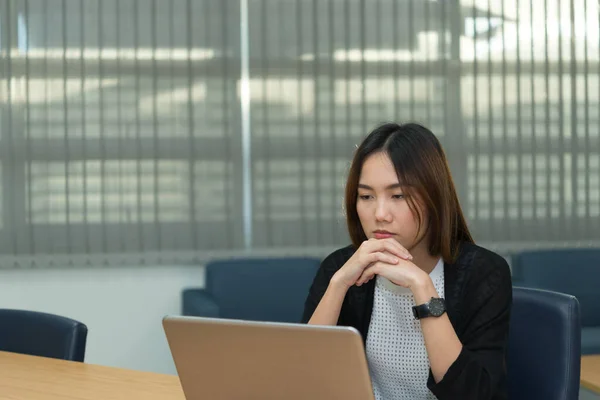 Asian businesswoman stress from hard work,Thai worker woman working in the office,Dark tone