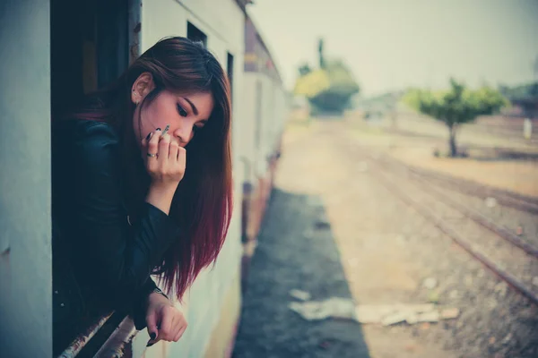 Asian woman sad from love,She smoking because stress from boyfriend,Heartbreak woman concept