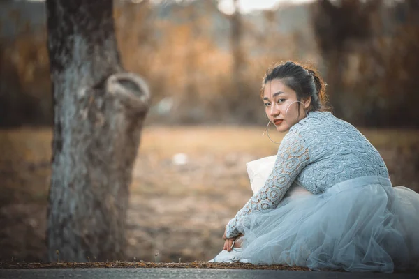 Asian woman sad from love,She worry because stress from boyfriend,Heartbreak woman concept,Thailand people