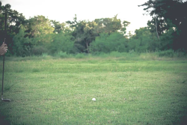 Golf on the lawn,golfer play golf with friend,thailand people