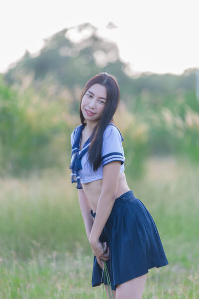 Portrait of asian woman wear student dress japan style