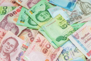 Para ve faturalarla dolu bir arka plan, yüz, bin.