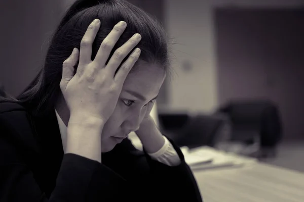 Asian businesswoman stress from hard work,Thai worker woman working in the office,Dark tone