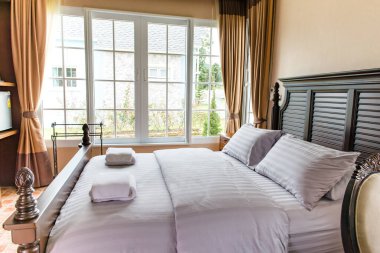 Güneşli bir günde, güzel ve modern bir yatak odası, Toskana tarzı, klasik oda tarzı, khaoyai, nakhonratchasima, thailand