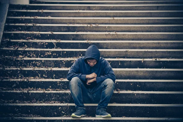 Portrait of asian man sad,drug addict man sitting on the floor,flakka drug,zombie drug,Sad man concept