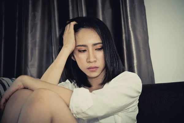 Asian woman sad from love,She worry because stress from boyfriend,Heartbreak woman concept,Thailand people