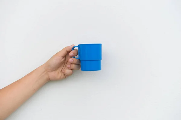 Blue Plastic Glass Drink Water Hand White Background — 스톡 사진