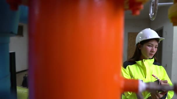 Female Asian Engineer Helmet Working Operating Hall — Stock Video