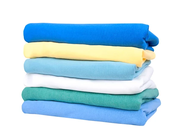 Stack of cotton clothes isolated.Folded clean colorful clothing Stock Picture