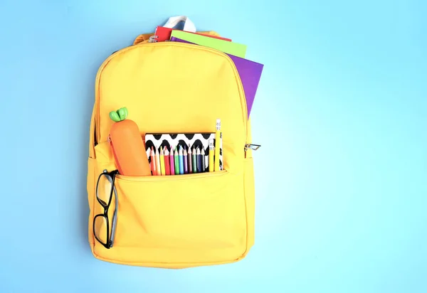Yellow Backpack School Supplies Top View Empty Copy Sapce Back — стоковое фото
