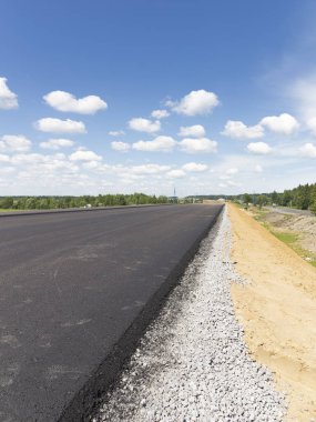 Kum ve çakıl teknolojisi, Rusya ile kırsal alanda yeni bir büyük asfalt yol inşaatı