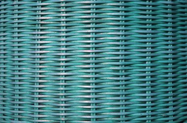 Arka plan ve desen için turkuaz mavi renkli rattan mobilya yüzeyinin ön görünümü