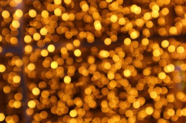 Aydınlatılmış Işıkların Altın Rengi Soyut Arkaplan ve Sancak İçin Bokeh