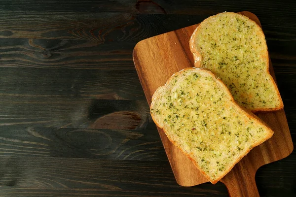 Top View Two Delicious Homemade Garlic Butter Toasts Breadboard Served — Stock Photo, Image