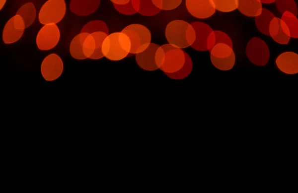 注意力不集中 Bokeh 黑暗中的焦化红光 用于设计和文字的抽象背景 — 图库照片