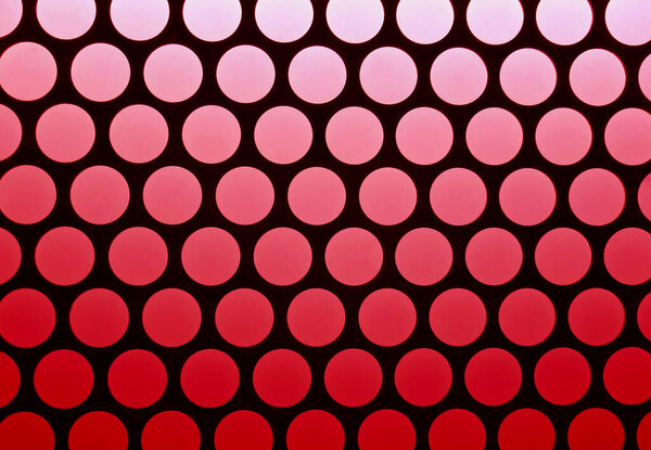 Geometric pattern of the elevator ceiling in red and black color