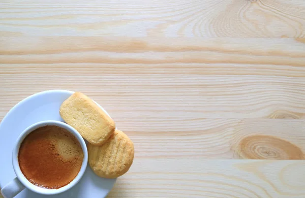 Vista Superior Uma Xícara Café Com Dois Biscoitos Manteiga Mesa — Fotografia de Stock