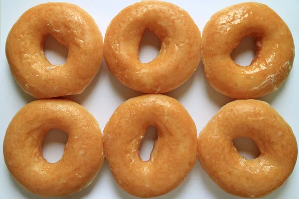 Draufsicht Auf Sechs Zuckerglasierte Donuts Zum Hintergrund — Stockfoto