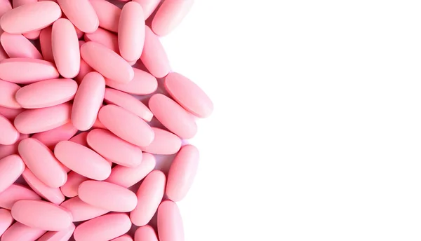 Heap Van Ovale Roze Kleur Tabletten Verspreid Witte Achtergrond — Stockfoto