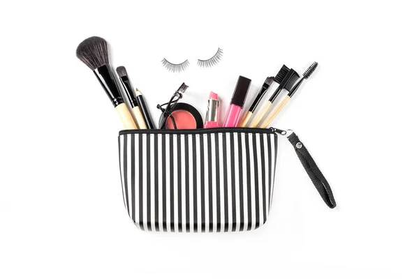 Make up bag with various cosmetics and brushes isolated — Stock Photo, Image