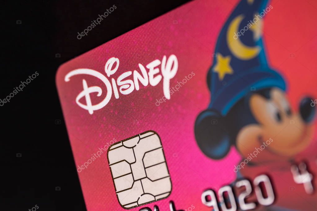 Indianapolis - Circa July 2018: Disney logo on a credit card. Disney is wrapping up the purchase of 21st Century Fox IV