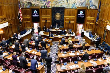 Indianapolis - Circa January 2019: Indiana State House of Representatives in session giving the Pledge of Allegiance II clipart