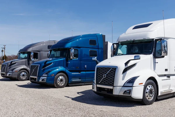 Muncie - Circa March 2019: Colorful Volvo Semi Tractor Trailer Trucks Lined up for Sale. Volvo is one of the largest truck manufacturers I — Stock Photo, Image