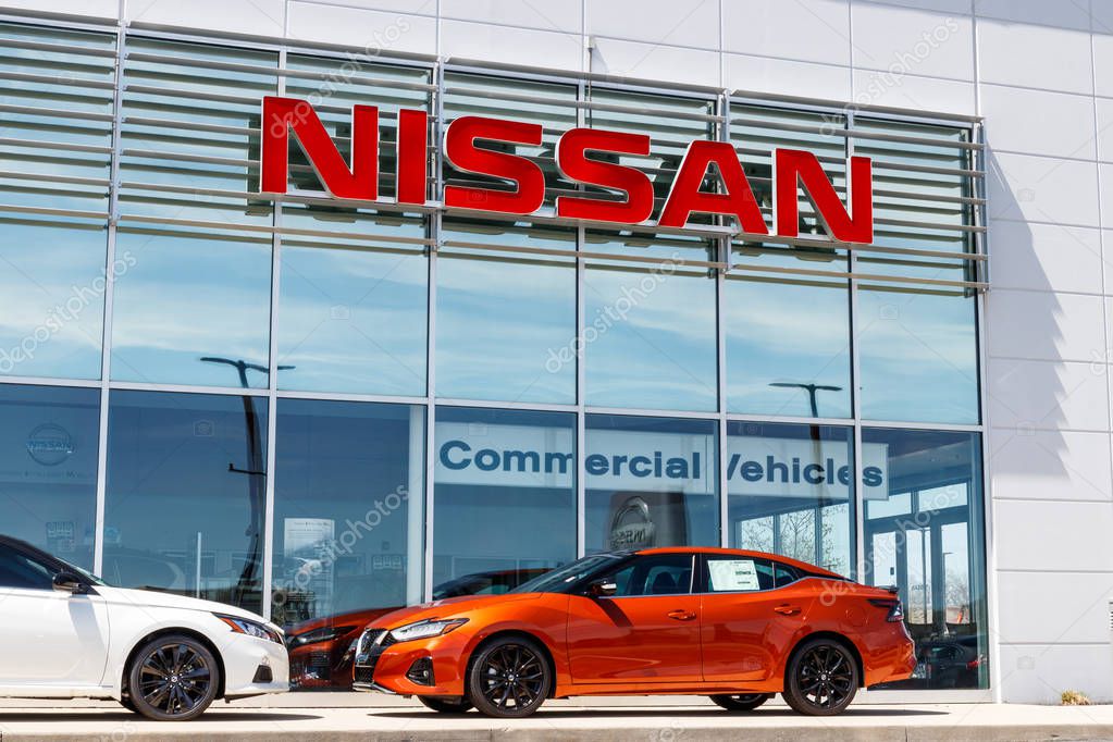Fishers - Circa April 2019: New vehicles at a Nissan Car and SUV Dealership. Nissan is part of the Renault Nissan Alliance I