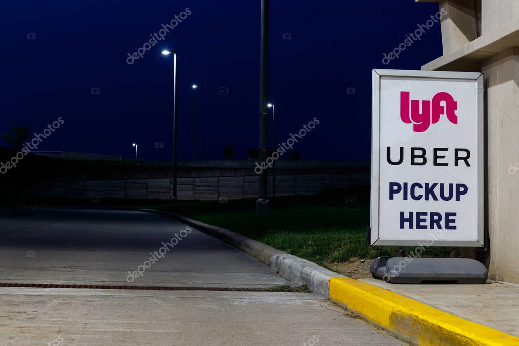 Indianapolis - Circa June 2019: Lyft and Uber pickup spot at the airport. Lyft and Uber ride sharing has replaced many Taxi cabs for transportation II