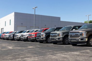 Indianapolis - Circa May 2020: Ford F150 display at a dealership. Ford sells products under the Lincoln and Motorcraft brands. clipart