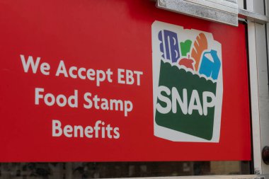 Logansport - Circa June 2020: SNAP and EBT Accepted here sign. SNAP and Food Stamps provide nutrition benefits to supplement the budgets of disadvantaged families. clipart