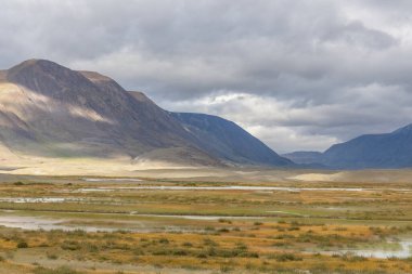 Mongolian landscapes in the Altai Mountains, wide landscape. clipart