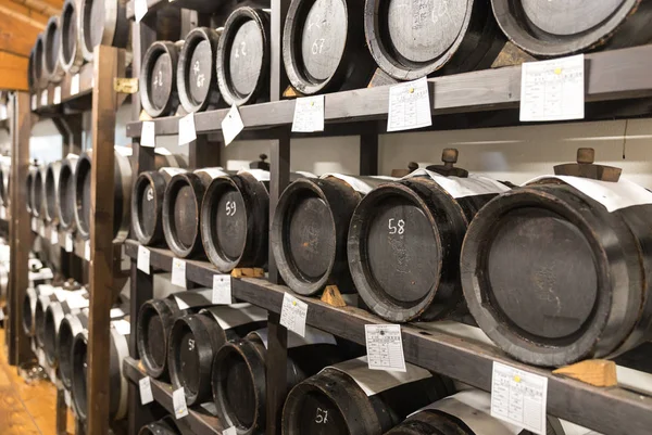 balsamic vinegar wooden barrels storing and aging