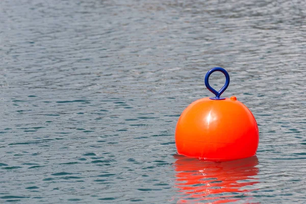 Red Buoy for safety swimming in water — Stock Photo, Image