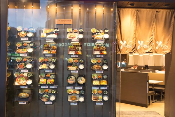 PHUKET, THAILAND - JANUARY 11, 2018: Japanese restaurant with plastic food display in Thailand — Stock Photo, Image