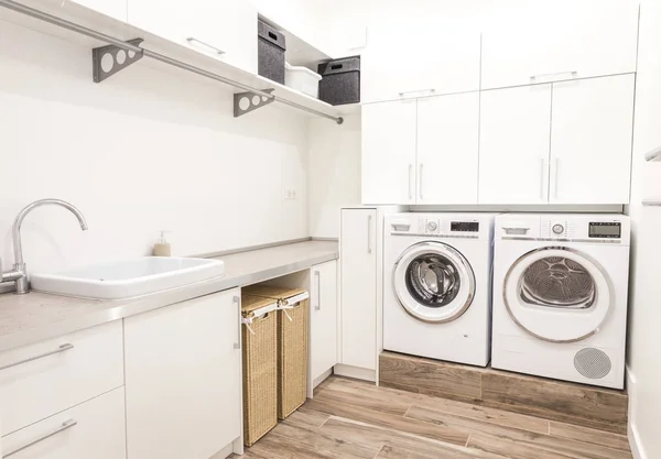 Laundry room with washing machine in modern house — Stock Photo, Image