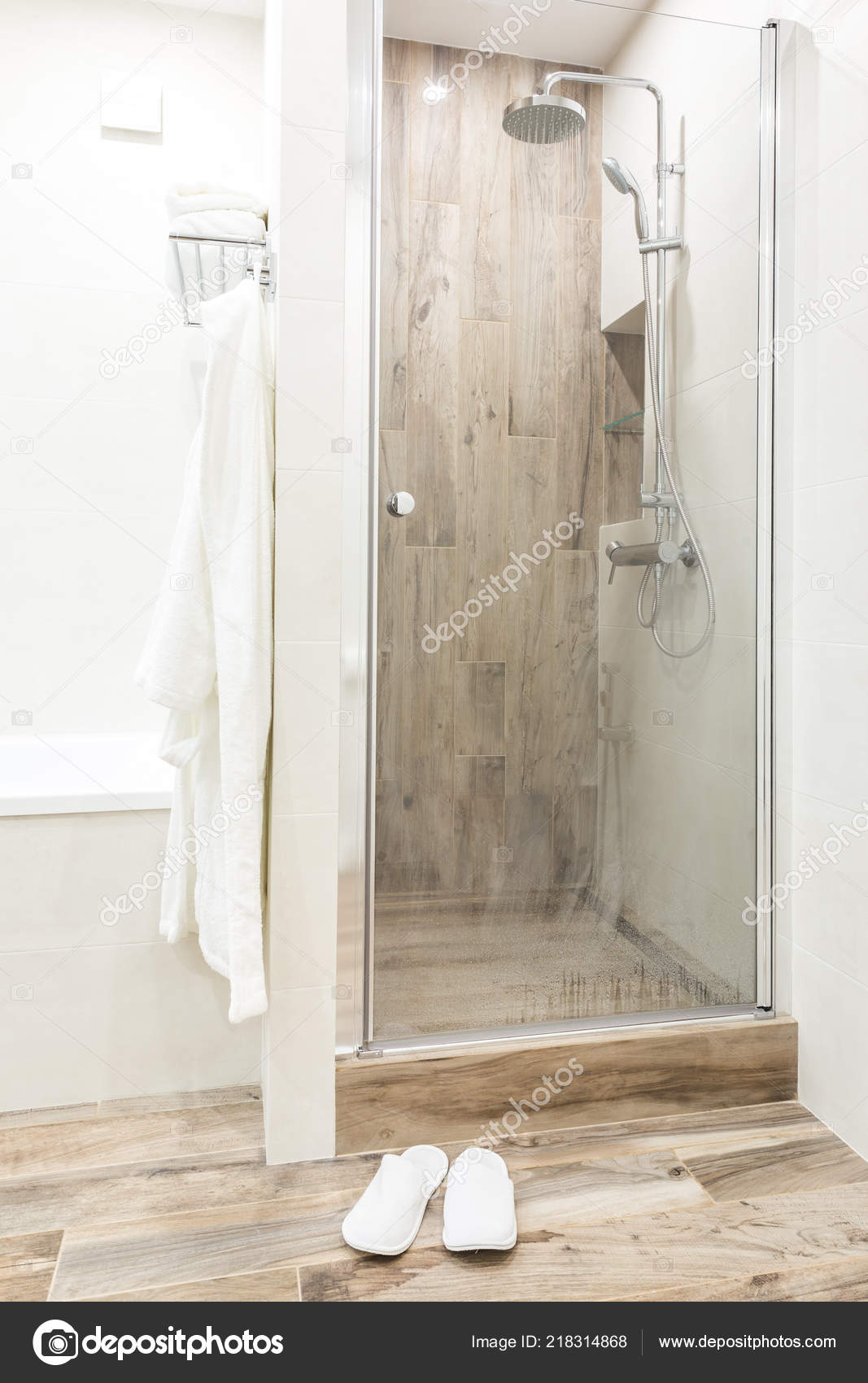 Walk In Shower Bathroom With Wooden Style Tile Stock Photo Walk In Shower Bathroom With Wooden Style Tile Glass Door And Hanging Bathrobe Photo By