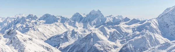 White snowy winter Caucasus mountains at sunny day. Panorama view from ski slope Elbrus, Russia — Stock Photo, Image