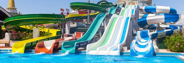 ANTALYA, TURKEY - MAY 11, 2014: Colorful waterpark tubes and a swimming pool in Delphin Imperial hotel on MAY 11, 2014 in Antalia — Stock Photo, Image