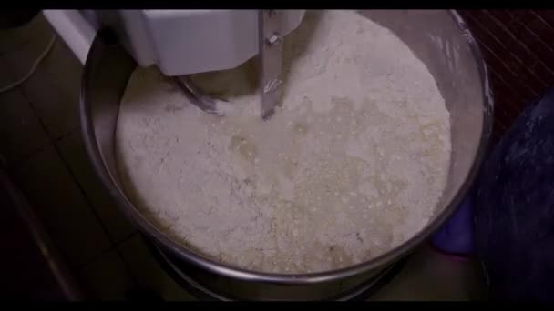 Closeup of equipment working dough. Food industry concept. — Stock Video