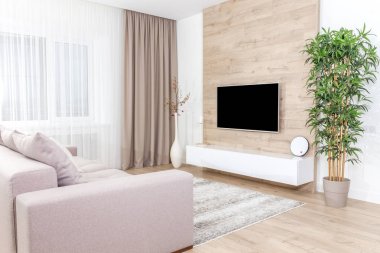 Oturma odası kanepe ve tv ahşap duvar üzerinde yol açtı.