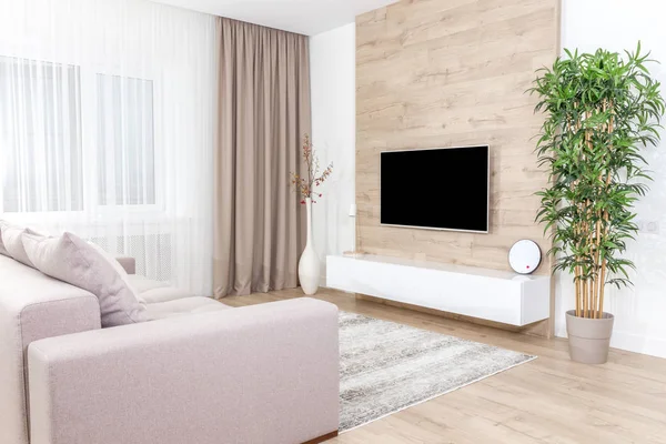 Living room with couch and led tv on wooden wall — Stock Photo, Image