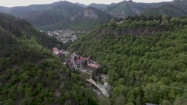 BORJOMI, GEORGIA, JULY 08, 2017: Aerial drone view of Borjomi resort town in central Georgia. Known for its mineral waters, with springs in Park. — Stock Video