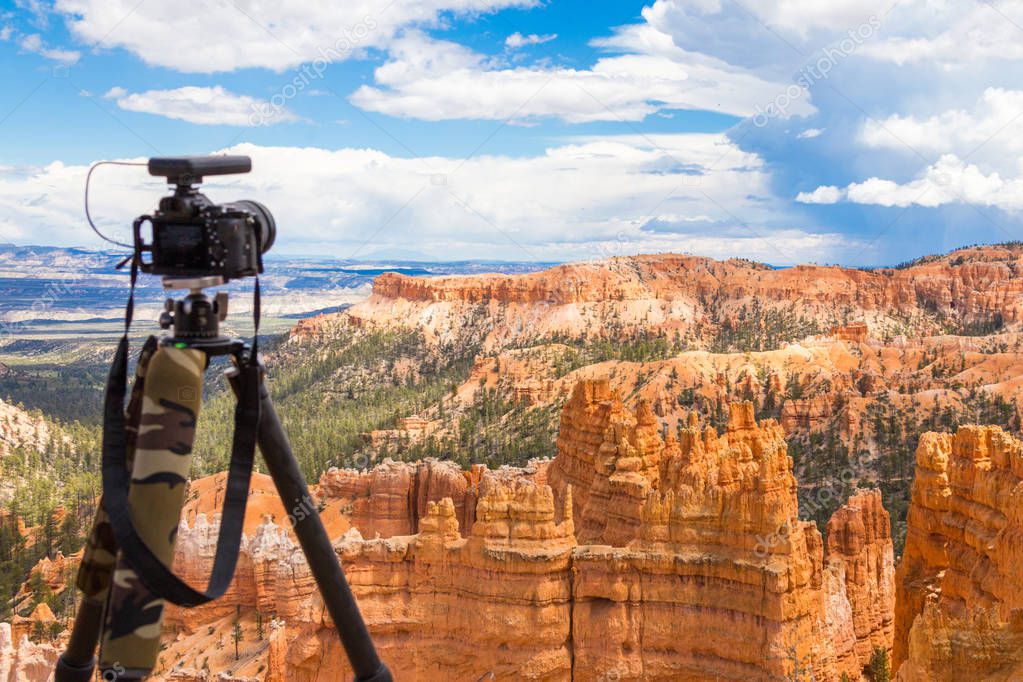 Camera on tripod ready to shoot in Bryce Canyon National Park at daytime, Utah, USA