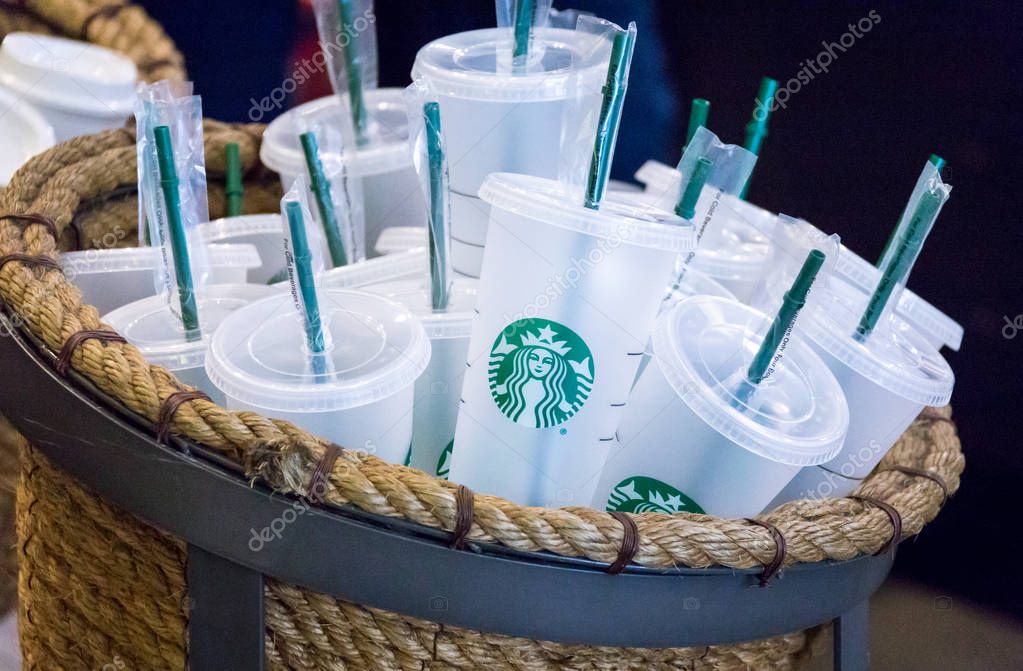 NEW YORK, USA - 17 MAY, 2019: Starbucks reusable coffee cups on sale in cafe in New York. People who use their own cup get discount for coffee