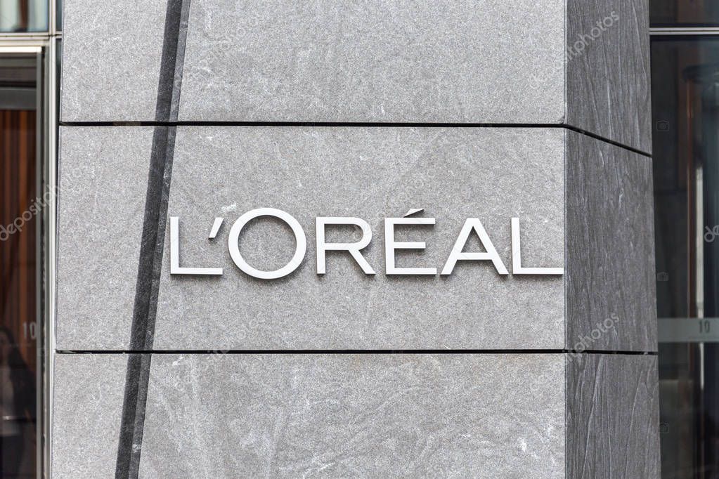 NEW YORK, USA - 17 MAY, 2019: Logo of the Loreal French personal care company on a building in New York office. The L Oreal Group is a French company active in the cosmetics and beauty