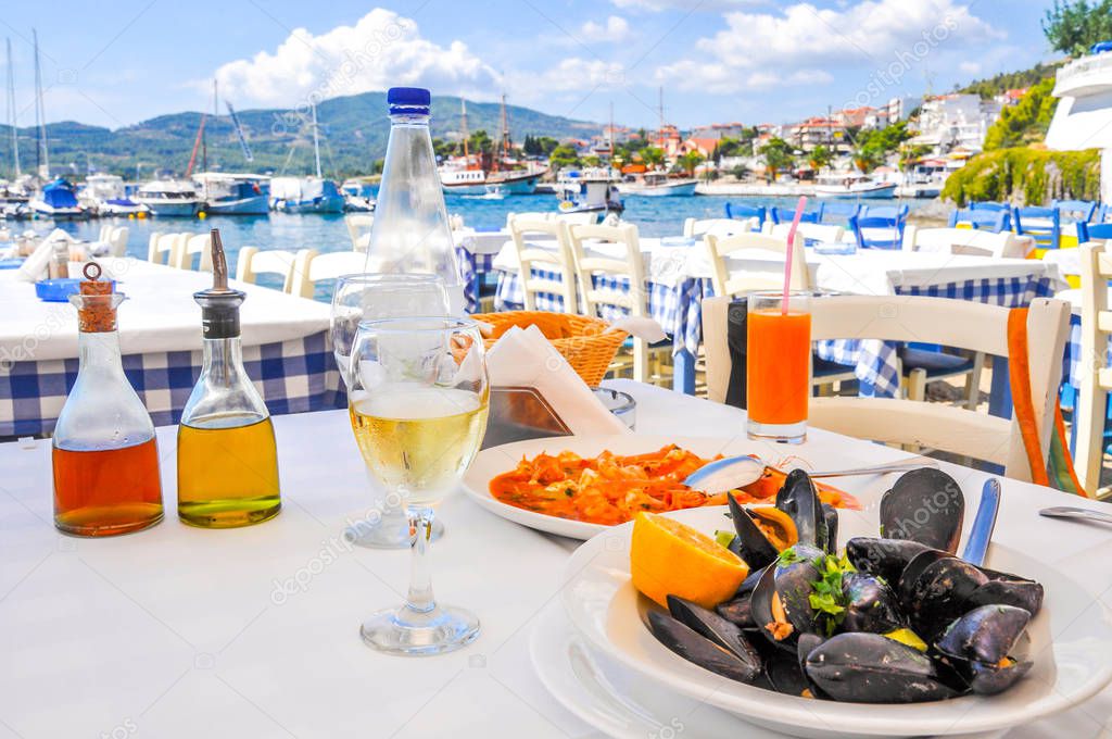 seafood dinner in a Greece resort near sea