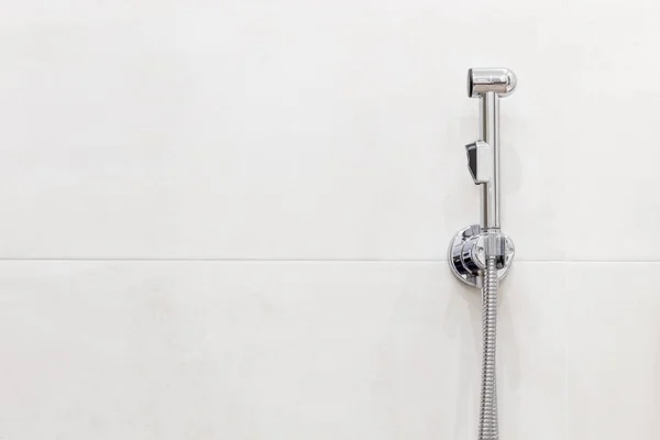 Bidet shower head with copy space. Modern bathroom interior. — Stock Photo, Image